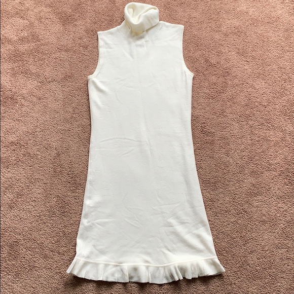 white sleeveless turtleneck dress